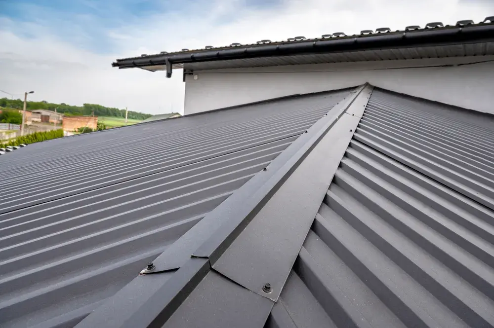 Metal roof installation with a sloped design